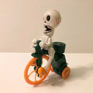 Halloween Plastic Skeleton Riding Bicycle Bike Lollipop Candy Holder Wind Up Toy